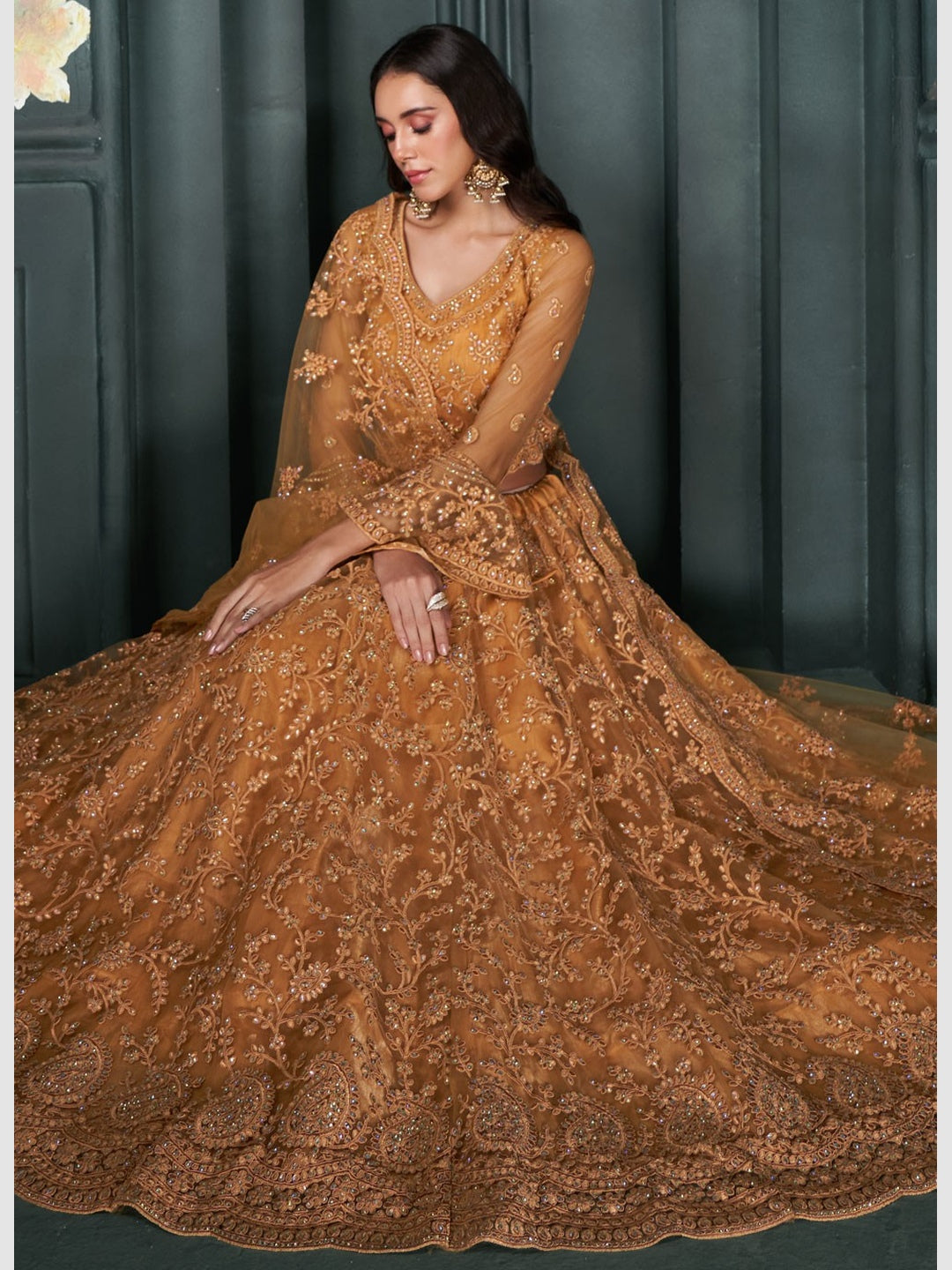 Burnt Orange Net Heavy Embroidered Flowy Royal Wedding Wear Lehenga Burnt Orange Net Heavy Embroidered Flowy Royal Wedding Wear Lehenga
