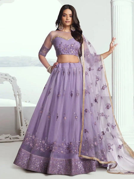 Lavender Net Sequins Embroidered Flowy Luxury Festive Wear Lehenga Choli by Fabricoz USA