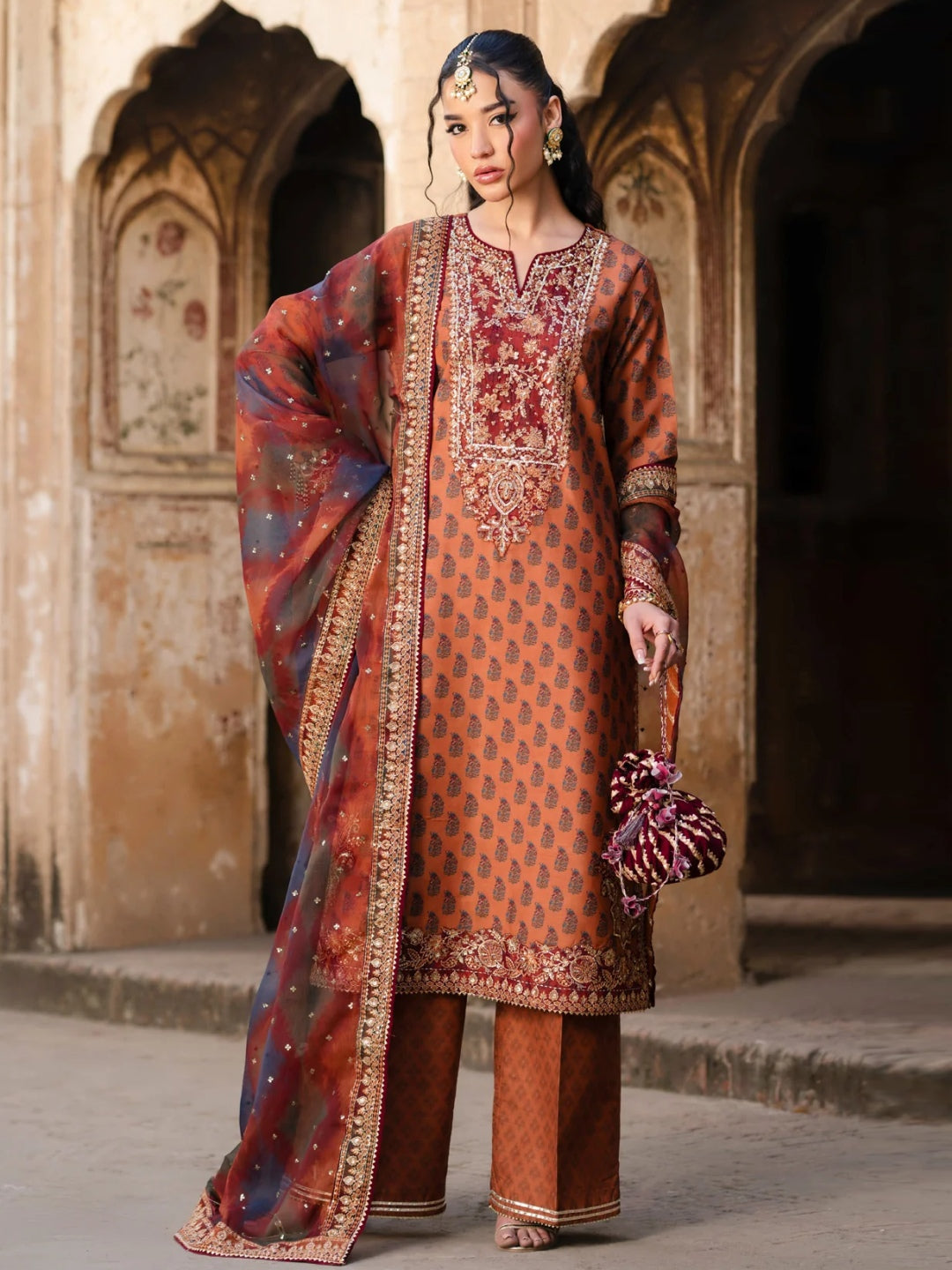 pakistani silk dresses The Eastern Pakistani silk dress is a captivating blend of traditional charm and modern elegance. The front of the dress is adorned with a shimmering all-over sequin spray, adding a touch of