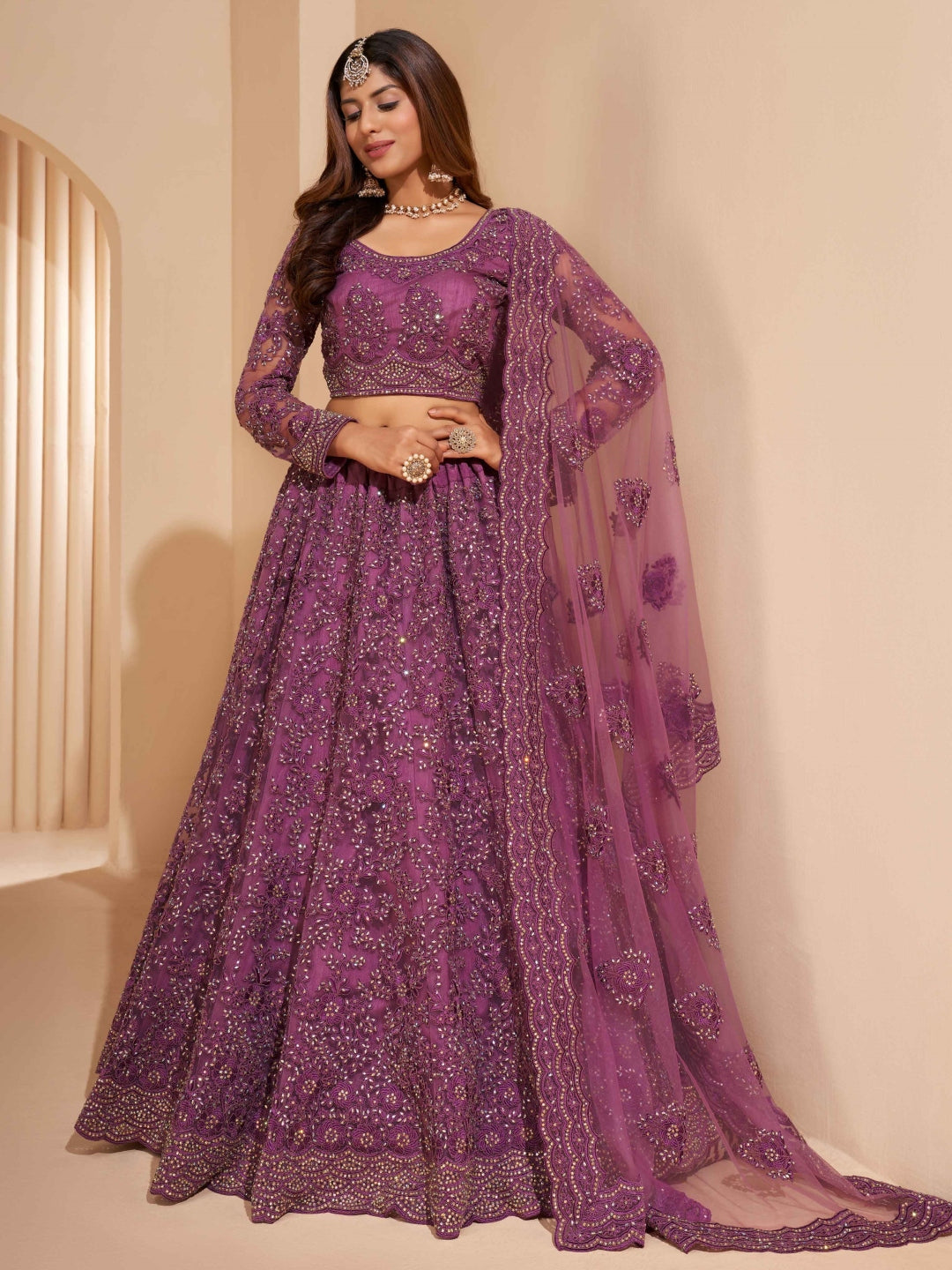 Plum Net Heavy Embroidered Flowy Premium Wedding Wear Plum Net Heavy Embroidered Flowy Premium Wedding Wear